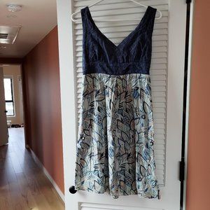 Dress with blue eyelet bodice and grey and blue floral print skirt